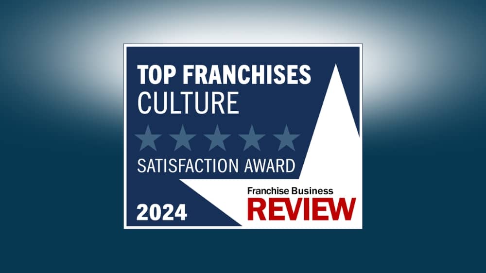 Franchise Business Review 2024 Top Franchises Culture award badge on a navy background.