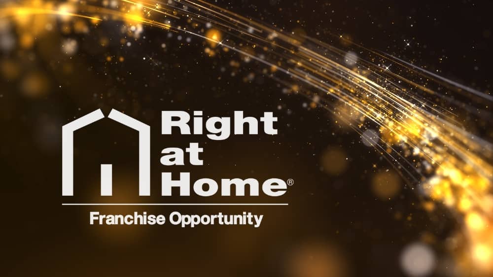 White Right at Home logo on a black background with gold lights shining in the background