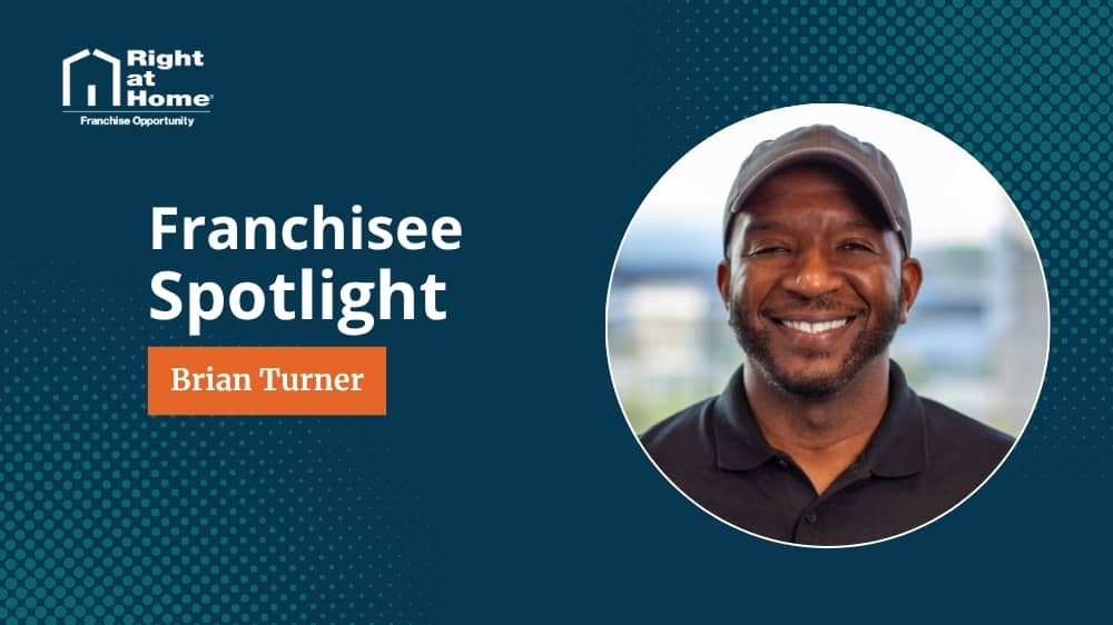 Right at Home franchise owner, Brian Turner, smiling during an interview with 1851 Franchise