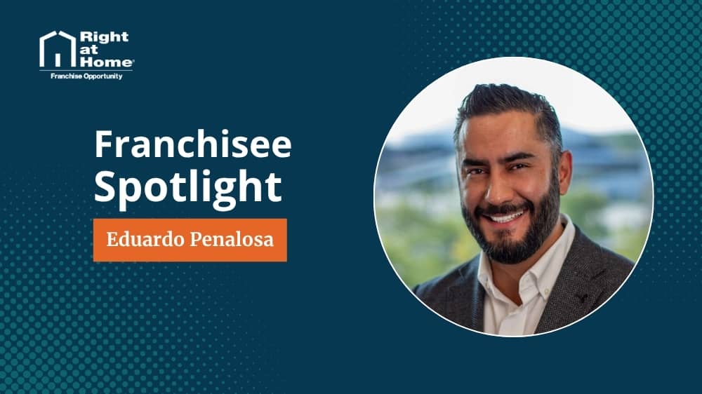 Right at Home franchise owner, Eduardo Penalosa, smiling during an interview with 1851 Franchise