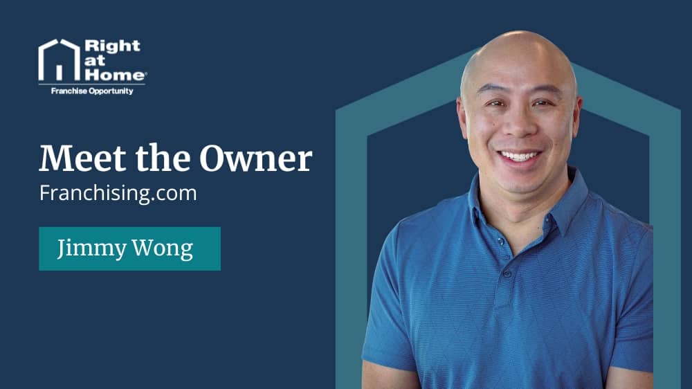Right at Home franchise owner, Jimmy Wong, smiling during an interview with Franchising.com