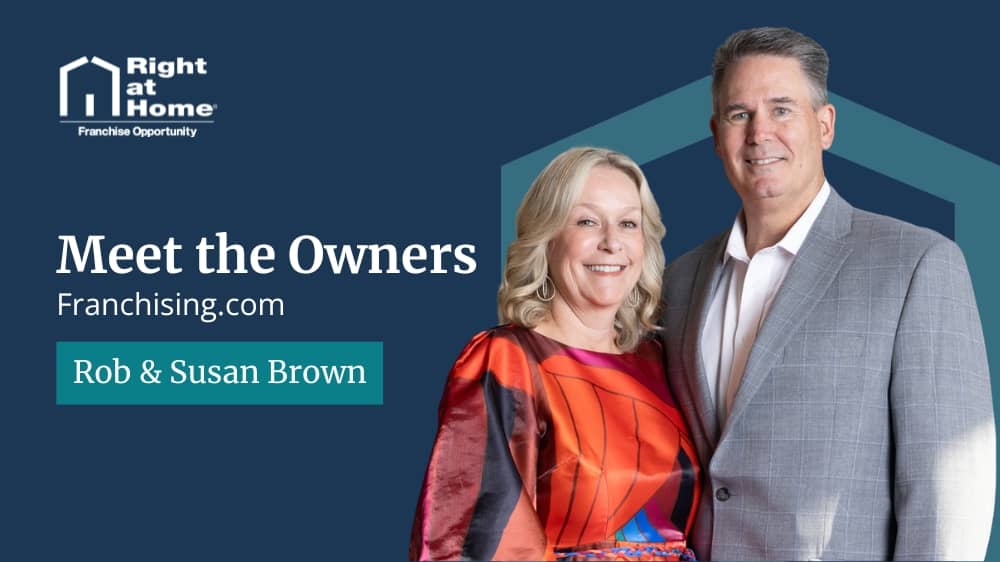 Right at Home franchise owners, Rob and Susan Brown, smiling during an interview with Franchising.com