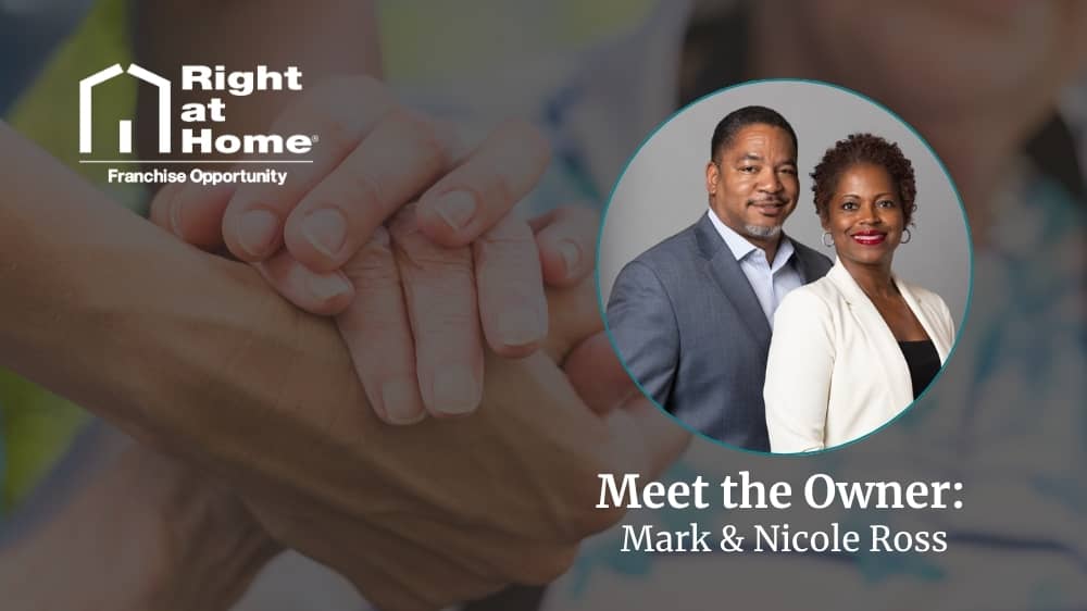 Right at Home franchise owners, Mark and Nicole Ross, smiling during an interview about their franchise journey