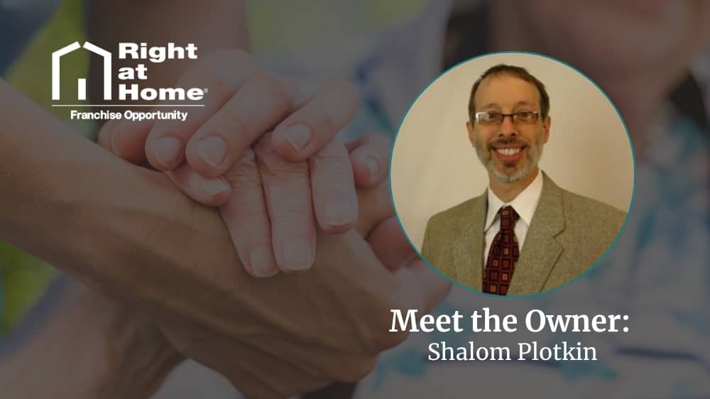 Right at Home franchise owner, Shalom Plotkin, smiling during an interview about his franchise journey