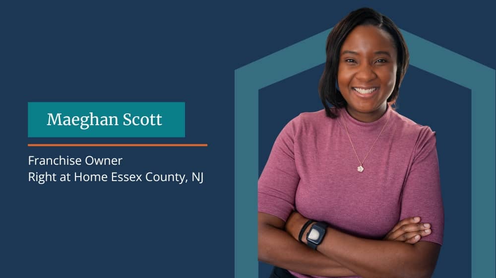 Right at Home franchsiee Maeghan Scott standing against a navy blue background