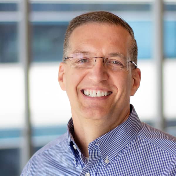 Professional headshot of Brian Curtis